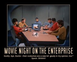 Movie Night on the Enterprise --- Scotty: Aye, Doctor - their costumes are a wee bit gaudy in my opinion, too.  Spock: Shhhhh!