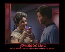 Aphrodexiac --- Nancy: Mmmm, red hots! Almost as good as salt tablets...