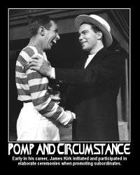 Pomp and Circumstance --- Early in his career, James Kirk initiated and participated in elaborate ceremonies when promoting subordinates.